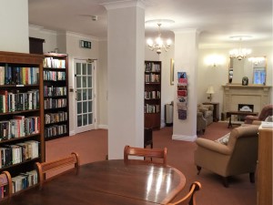 lounge with bookcases. Photo by HelpStation